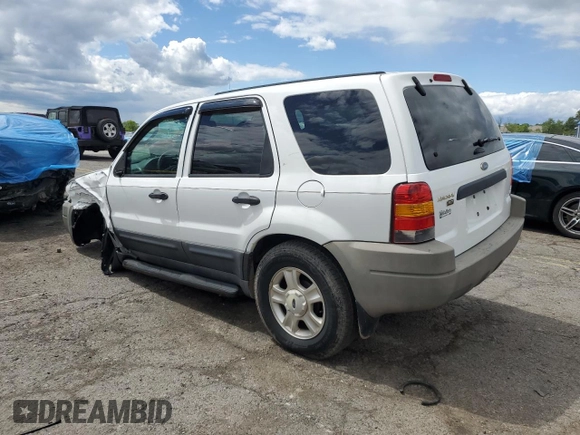 2003 Ford Escape XLT Popular 2 with VIN 1FMYU93133KD76423, listed as a Copart auction lot 57780455 with 98,779 mi miles and Salvage title. Bid and sale history available at DreamBid. Image 2.