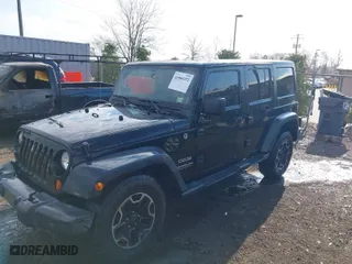 2013 Jeep Wrangler Unlimited Freedom Edition with VIN 1C4BJWDG8DL648870, listed as a IAAI auction lot 41909372 with 184,203 mi miles. Bid and sale history available at carsss.com. Image 2.