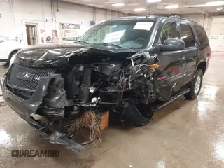 2007 GMC Yukon SLT z VIN 1GKFK13057R417047, wystawiony jako IAAI lot #42061633 z przebiegiem 183 130 mil mil oraz . Historia ofert i sprzedaży dostępna na DreamBid. Obrazek 6.