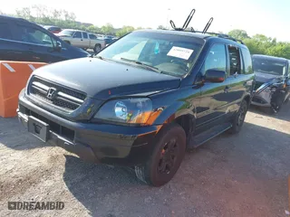 2004 Honda Pilot EX with VIN 2HKYF18614H535377, listed as a IAAI auction lot 42099729 with 362,460 mi miles. Bid and sale history available at carsss.com. Image 2.