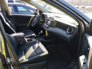 2016 Toyota RAV4 LE with VIN 2T3ZFREV7GW305998, listed as a IAAI auction lot 41869024 with 163,463 mi miles. Bid and sale history available at carsss.com. Image 5.