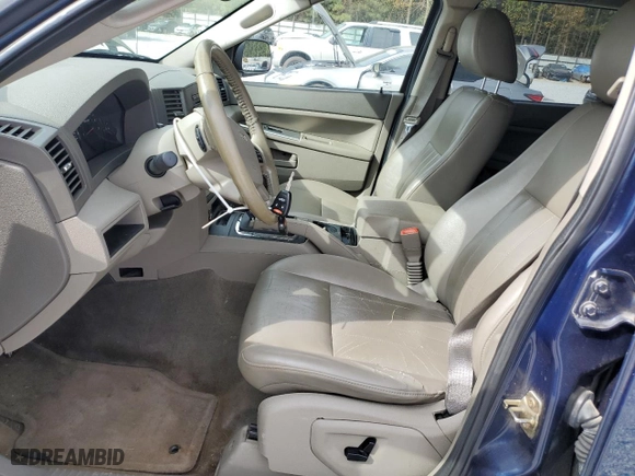 2005 Jeep Grand Cherokee Laredo with VIN 1J4HS48N75C724594, listed as a Copart auction lot 77941094 with 0 mi miles and Salvage Title. Bid and sale history available at carsss.com. Image 7.