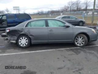 2006 Toyota Avalon XL with VIN 4T1BK36B16U111487, listed as a IAAI auction lot 41816193 with 214,557 mi miles. Bid and sale history available at carsss.com. Image 12.
