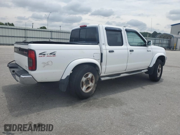 2000 Nissan Frontier XE with VIN 1N6ED27Y6YC334154, listed as a Copart auction lot 54140454 with 330,552 mi miles and Salvage title. Bid and sale history available at DreamBid. Image 3.