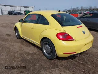 2012 Volkswagen Beetle 2.5L PZEV with VIN 3VWJP7AT3CM659061, listed as a IAAI auction lot 41935151 with 101,339 mi miles. Bid and sale history available at carsss.com. Image 3.