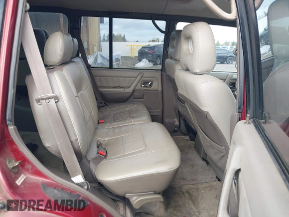 1998 Mitsubishi Montero z VIN JA4MR51RXWJ003468, wystawiony jako IAAI lot #41916695 z przebiegiem 214 694 mil mil oraz . Historia ofert i sprzedaży dostępna na DreamBid. Obrazek 8.