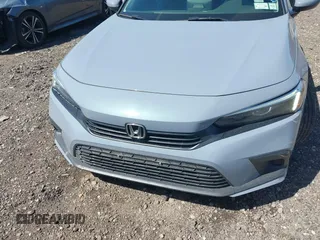 2024 Honda Civic EX z VIN 2HGFE1F74RH319661, wystawiony jako IAAI lot #42066326 z przebiegiem 34 629 mil mil oraz . Historia ofert i sprzedaży dostępna na DreamBid. Obrazek 12.