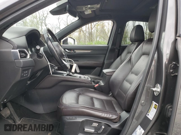 2019 Mazda CX-5 Signature with VIN JM3KFBEY3K0521581, listed as a Copart auction lot 53112925 with 62,977 mi miles and Salvage Title. Bid and sale history available at carsss.com. Image 7.