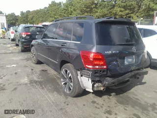 2014 Mercedes-Benz GLK-Class GLK 350 with VIN WDCGG8JB9EG328003, listed as a IAAI auction lot 31426005 with 158,406 mi miles. Bid and sale history available at carsss.com. Image 3.