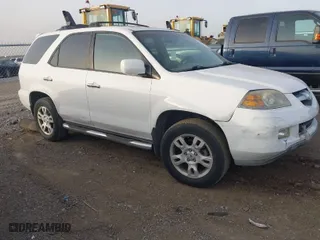 2005 Acura MDX Touring with VIN 2HNYD18665H558857, listed as a IAAI auction lot 41829809 with 157,147 mi miles. Bid and sale history available at carsss.com. Image 1.