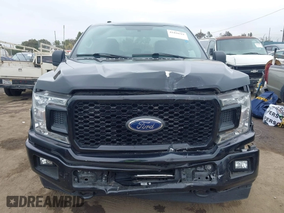 2018 Ford F-150 XL with VIN 1FTEX1EP6JKF59667, listed as a IAAI auction lot 42410311 with 134,385 mi miles and . Bid and sale history available at DreamBid. Image 12.