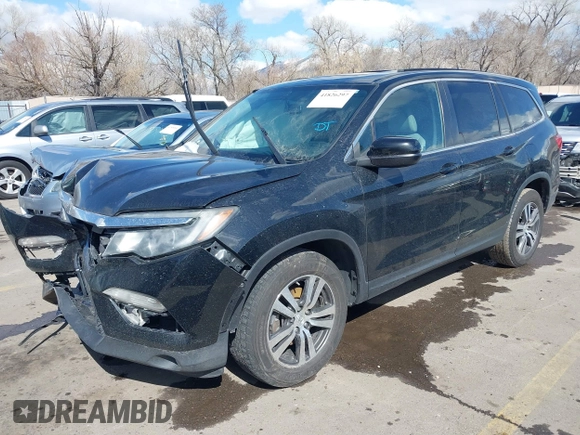 2016 Honda Pilot EX-L with VIN 5FNYF6H53GB048317, listed as a IAAI auction lot 41826297 with 127,672 mi miles. Bid and sale history available at carsss.com. Image 17.