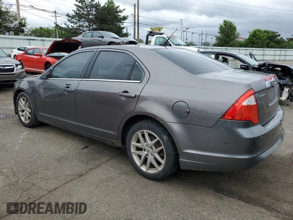 2012 Ford Fusion SEL z VIN 3FAHP0JA2CR232860, wystawiony jako Copart lot #57754735 z przebiegiem 234 638 mil mil oraz Szkody całkowita. Historia ofert i sprzedaży dostępna na DreamBid. Obrazek 2.