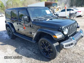 2023 Jeep Wrangler Sahara with VIN 1C4JJXP64PW559398, listed as a IAAI auction lot 41796904 with Not Provided miles and . Bid and sale history available at DreamBid. Image 1.