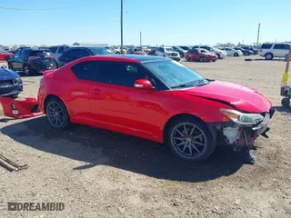 2016 Scion tC with VIN JTKJF5C7XGJ023727, listed as a IAAI auction lot 41651454 with 152,919 mi miles. Bid and sale history available at carsss.com. Image 1.