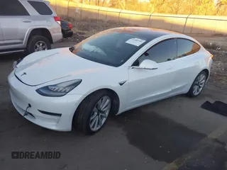 2018 Tesla Model 3 Long Range Battery z VIN 5YJ3E1EB4JF067895, wystawiony jako IAAI lot #41280101 z przebiegiem Nie podano mil oraz . Historia ofert i sprzedaży dostępna na DreamBid. Obrazek 2.