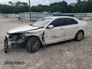2012 Ford Fusion SEL z VIN 3FAHP0JG8CR406581, wystawiony jako Copart lot #60820525 z przebiegiem 151 932 mil mil oraz Szkoda całkowita • Salvage title. Historia ofert i sprzedaży dostępna na DreamBid. Obrazek 1.