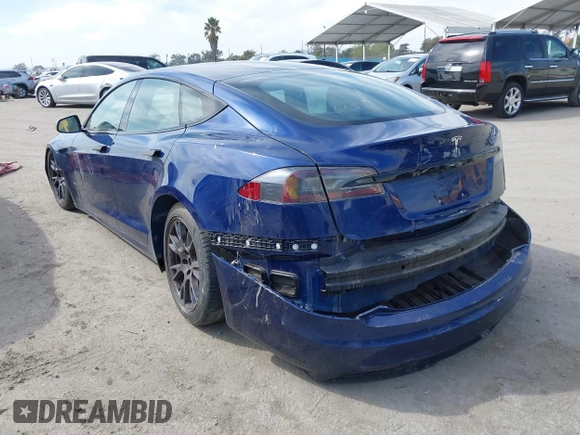 2021 Tesla Model S Long Range with VIN 5YJSA1E51MF442874, listed as a IAAI auction lot 39406495 with 36,127 mi miles and . Bid and sale history available at DreamBid. Image 3.