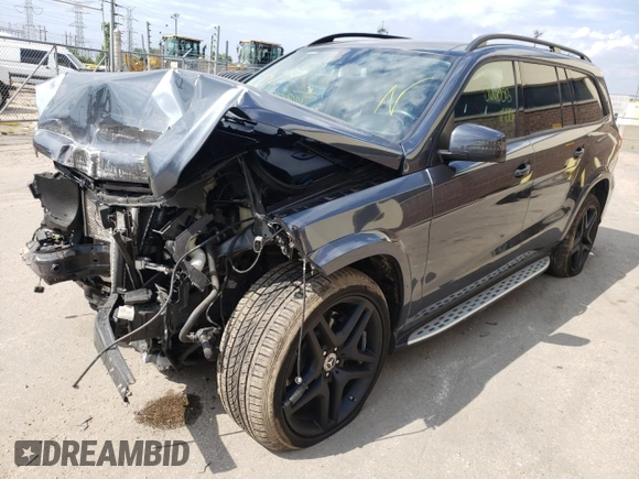 2015 Mercedes-Benz GL-Class GL 550 with VIN 4JGDF7DE7FA561521, listed as a Copart auction lot 56681512 with 67,329 mi miles. Bid and sale history available at carsss.com. Image 2.