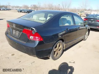 2006 Honda Civic Sdn EX with VIN 1HGFA16826L133698, listed as a IAAI auction lot 41870828 with 202,030 mi miles. Bid and sale history available at carsss.com. Image 4.