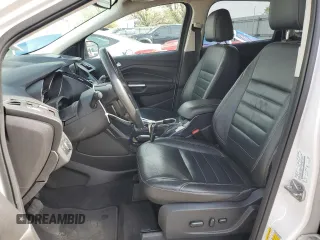 2015 Ford Escape Titanium with VIN 1FMCU0J99FUA16290, listed as a Copart auction lot 52496855 with 107,674 mi miles and Salvage Title. Bid and sale history available at DreamBid. Image 7.