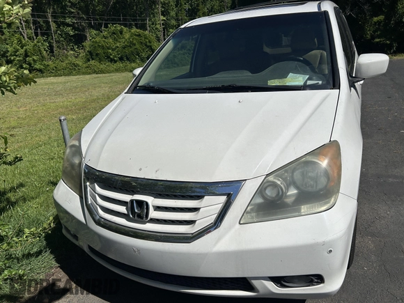 2009 Honda Odyssey Touring with VIN 5FNRL38819B025126, listed as a IAAI auction lot 42219263 with 187,191 mi miles and . Bid and sale history available at carsss.com. Image 6.