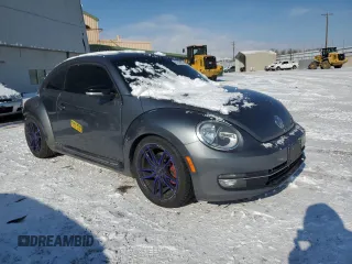 2012 Volkswagen Beetle 2.0T Turbo w/Sun/Snd/Nav PZEV with VIN 3VWVA7AT1CM609293, listed as a Copart auction lot 43752095 with 92,048 mi miles and Salvage Title. Bid and sale history available at carsss.com. Image 4.
