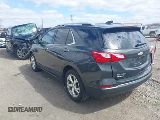 2018 Chevrolet Equinox Premier with VIN 2GNAXVEVXJ6188205, listed as a IAAI auction lot 42028868 with 93,828 mi miles and . Bid and sale history available at DreamBid. Image 3.