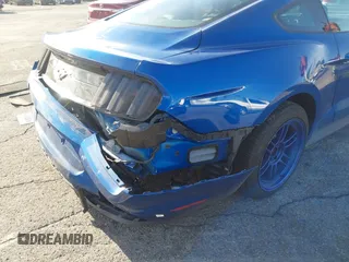 2018 Ford Mustang EcoBoost z VIN 1FA6P8TH0J5172447, wystawiony jako IAAI lot #41657679 z przebiegiem 21 422 mil mil oraz . Historia ofert i sprzedaży dostępna na DreamBid. Obrazek 6.