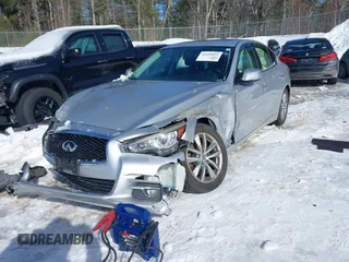 2015 Infiniti Q50 Premium z VIN JN1BV7ARXFM395132, wystawiony jako IAAI lot #41618895 z przebiegiem 96 951 mil mil oraz . Historia ofert i sprzedaży dostępna na DreamBid. Obrazek 16.