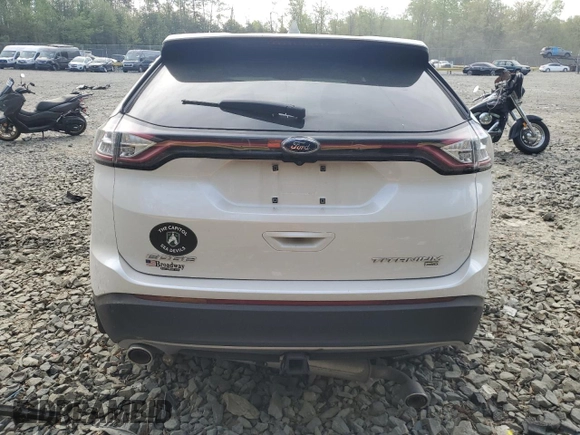 2017 Ford Edge Titanium z VIN 2FMPK4K80HBC30050, wystawiony jako Copart lot #54122585 z przebiegiem 58 023 mil mil oraz Szkoda całkowita • Salvage title. Historia ofert i sprzedaży dostępna na DreamBid. Obrazek 6.