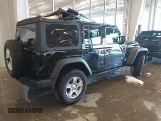 2021 Jeep Wrangler Unlimited Sport S z VIN 1C4HJXDG5MW744101, wystawiony jako IAAI lot #41258885 z przebiegiem Nie podano mil oraz . Historia ofert i sprzedaży dostępna na DreamBid. Obrazek 4.