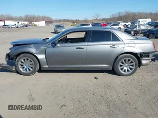 2012 Chrysler 300 with VIN 2C3CCAAG1CH138303, listed as a IAAI auction lot 41773979 with 252,550 mi miles and . Bid and sale history available at DreamBid. Image 14.