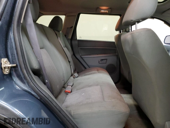 2007 Jeep Grand Cherokee Laredo z VIN 1J8GR48K57C580977, wystawiony jako Copart lot #57400605 z przebiegiem 208 268 mil mil oraz Czysty tytuł • Clean title. Historia ofert i sprzedaży dostępna na DreamBid. Obrazek 11.