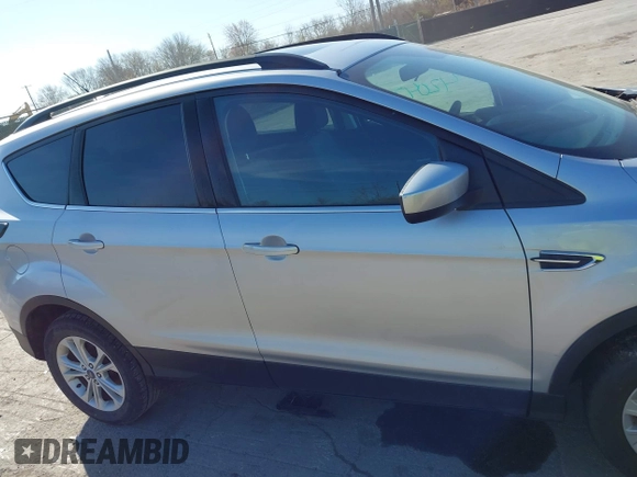 2017 Ford Escape SE with VIN 1FMCU0GDXHUB27848, listed as a IAAI auction lot 42047589 with 128,823 mi miles. Bid and sale history available at carsss.com. Image 13.