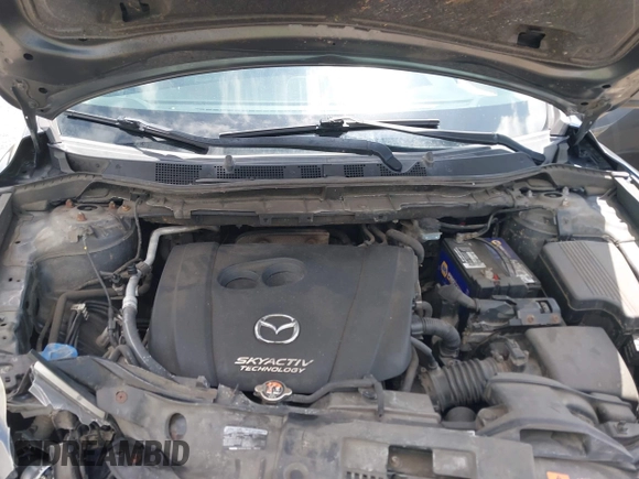 2014 Mazda CX-5 Sport with VIN JM3KE2BE0E0411377, listed as a IAAI auction lot 42143229 with 137,384 mi miles and . Bid and sale history available at carsss.com. Image 10.