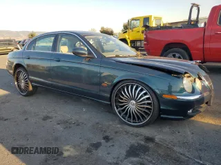 2003 Jaguar S-Type z VIN SAJEA01U73HM48330, wystawiony jako Copart lot #80128574 z przebiegiem Nie podano mil oraz Szkody całkowita. Historia ofert i sprzedaży dostępna na DreamBid. Obrazek 4.