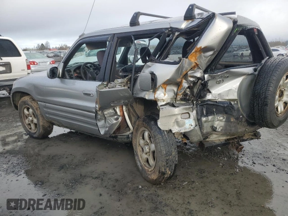 2000 Toyota RAV4 with VIN JT3HP10V7Y7169097, listed as a Copart auction lot 43357225 with 295,509 mi miles and Salvage title. Bid and sale history available at DreamBid. Image 2.