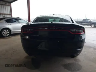 2021 Dodge Charger Police with VIN 2C3CDXAT5MH663136, listed as a IAAI auction lot 40348927 with 66,501 mi miles and . Bid and sale history available at DreamBid. Image 17.