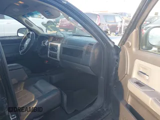 2008 Dodge Dakota Laramie with VIN 1D7HW58N18S593890, listed as a IAAI auction lot 41762135 with 109,669 mi miles. Bid and sale history available at carsss.com. Image 5.