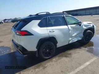 2022 Toyota RAV4 Hybrid XSE with VIN JTME6RFV9ND534822, listed as a IAAI auction lot 42477646 with 49,991 mi miles and . Bid and sale history available at DreamBid. Image 4.