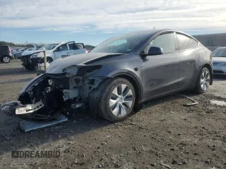 2023 Tesla Model Y Long Range z VIN 7SAYGAEE8PF902046, wystawiony jako Copart lot #84325394 z przebiegiem Nie podano mil oraz Szkoda całkowita • Salvage title. Historia ofert i sprzedaży dostępna na DreamBid. Obrazek 1.