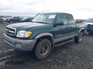 2000 Toyota Tundra Limited with VIN 5TBBT4812YS031675, listed as a IAAI auction lot 41626727 with 257,195 mi miles. Bid and sale history available at carsss.com. Image 17.