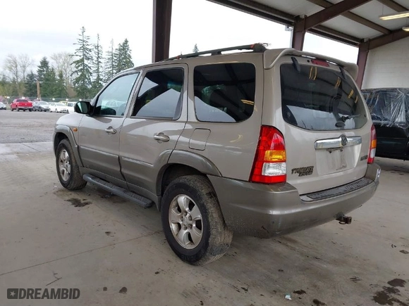 2002 Mazda Tribute LX with VIN 4F2YU08192KM29763, listed as a IAAI auction lot 41931794 with 193,771 mi miles. Bid and sale history available at carsss.com. Image 3.