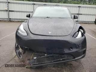 2022 Tesla Model Y Performance с VIN 7SAYGDEF5NF554018, выставлен на аукционе Copart как лот 65062185 с пробегом Не указан миль и Списание • Salvage title. История ставок и продаж доступна на DreamBid. Изображение 5.