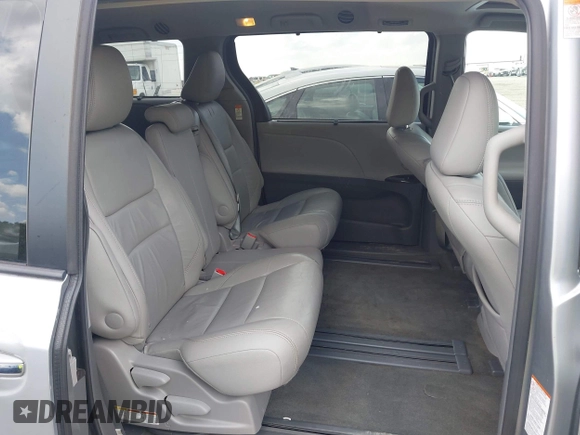 2015 Toyota Sienna XLE with VIN 5TDYK3DC7FS659864, listed as a IAAI auction lot 41958112 with 121,257 mi miles and . Bid and sale history available at DreamBid. Image 8.