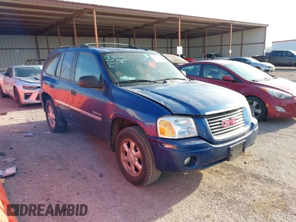 2006 GMC Envoy SLE with VIN 1GKDS13SX62315193, listed as a IAAI auction lot 41866029 with 231,164 mi miles. Bid and sale history available at carsss.com. Image 1.