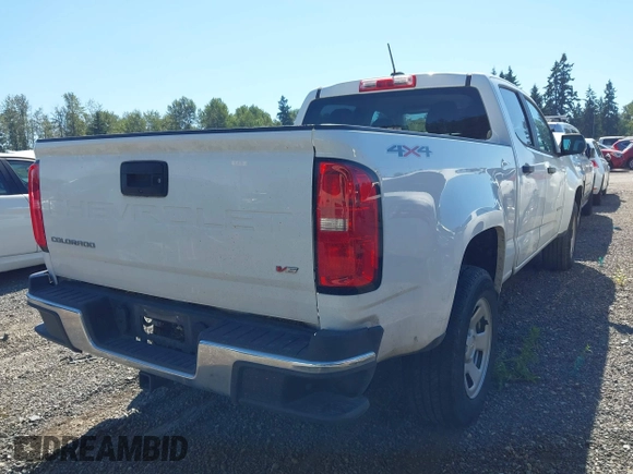 2021 Chevrolet Colorado 4WD Work Truck with VIN 1GCGTBEN0M1233723, listed as a IAAI auction lot 42600025 with 58,906 mi miles and . Bid and sale history available at DreamBid. Image 4.