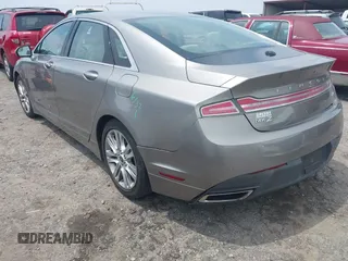 2016 Lincoln MKZ z VIN 3LN6L2G90GR621326, wystawiony jako IAAI lot #42375905 z przebiegiem 56 169 mil mil oraz . Historia ofert i sprzedaży dostępna na DreamBid. Obrazek 3.