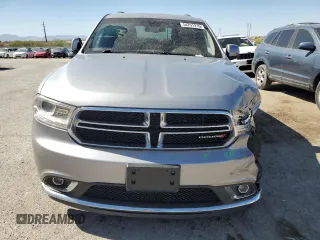 2014 Dodge Durango SXT z VIN 1C4RDJAG6EC972818, wystawiony jako Copart lot #54791215 z przebiegiem 169 718 mil mil oraz Szkoda całkowita • Salvage title. Historia ofert i sprzedaży dostępna na DreamBid. Obrazek 5.